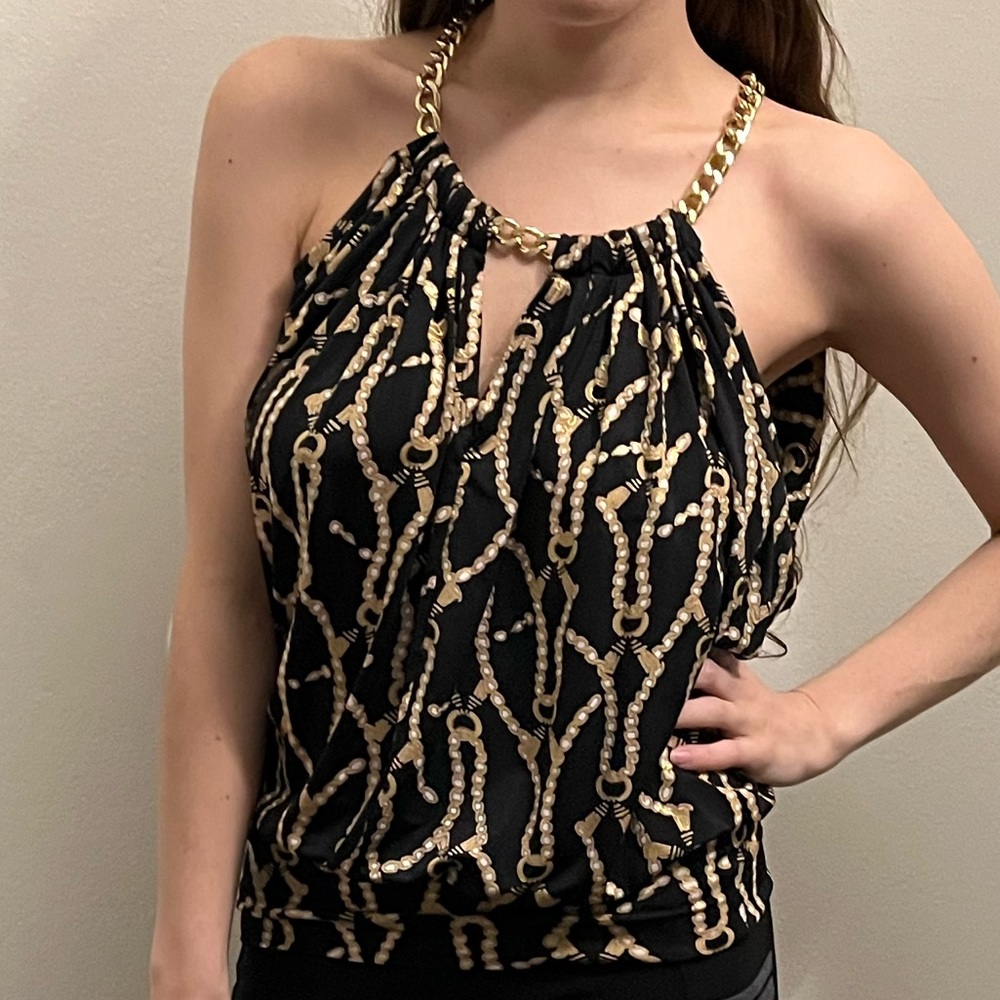 cache black and gold top